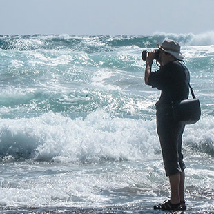 Jim Laser taking pictures at the beach